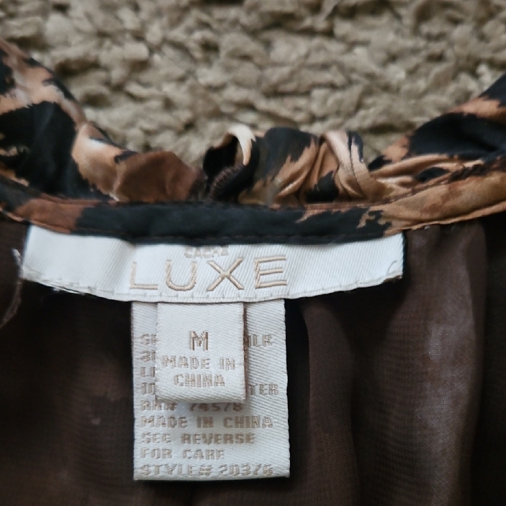 Luxe Black and brown Sleeveless Peplum Blouse - Picture 4 of 6